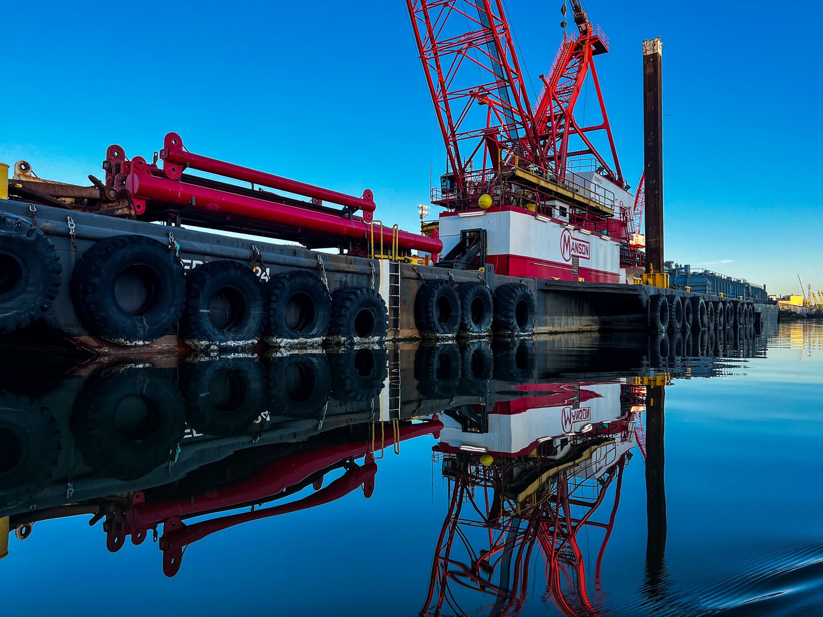 Crane barge reflection