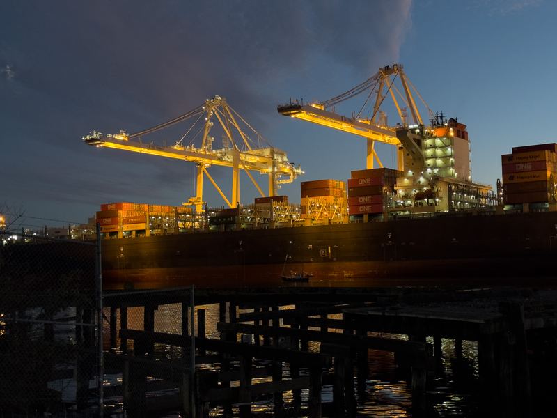 Container cranes at night