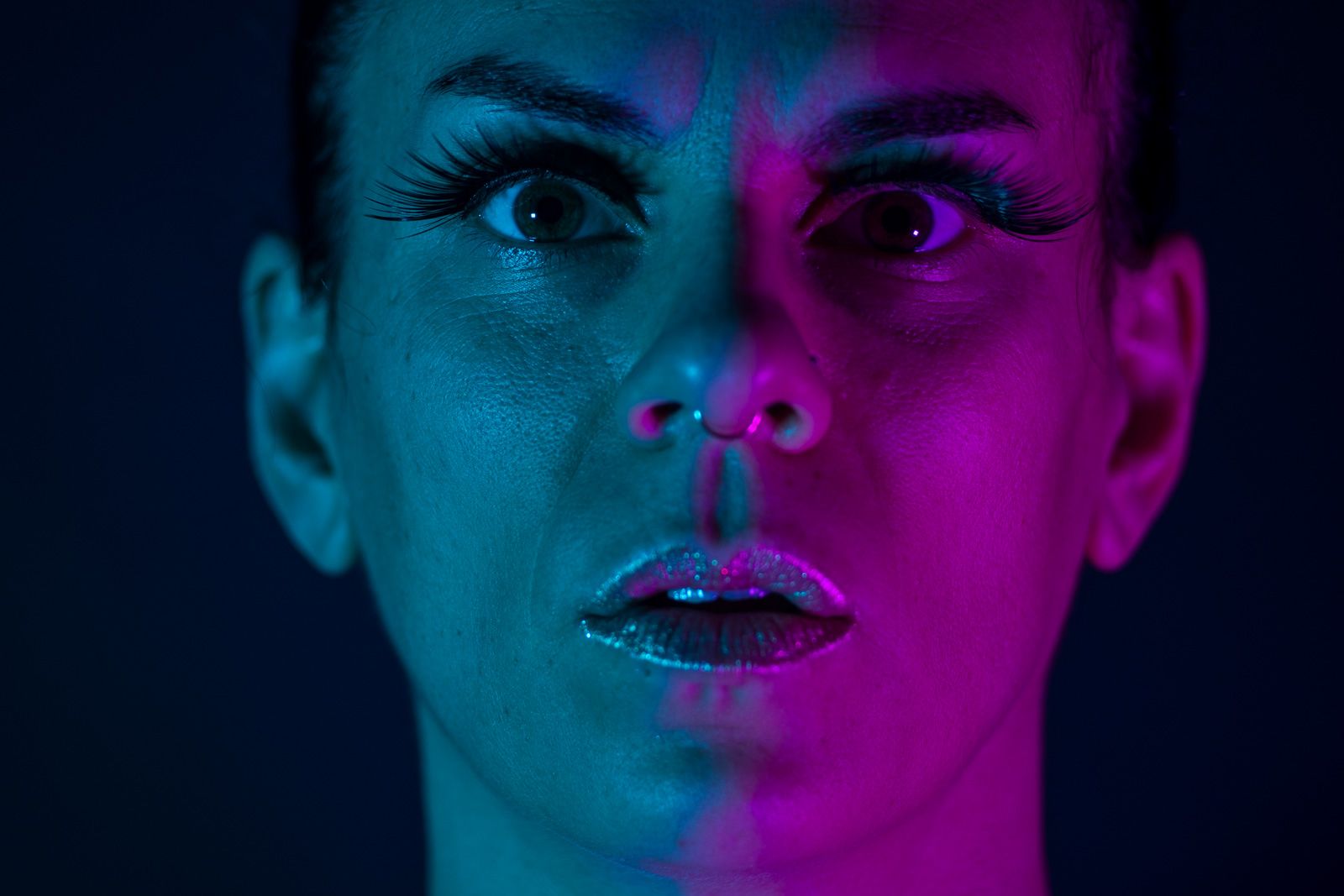 Portrait in blue and magenta light